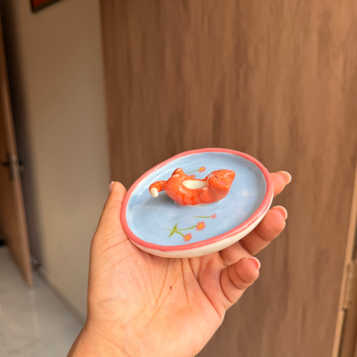 Orange happy cat trinket