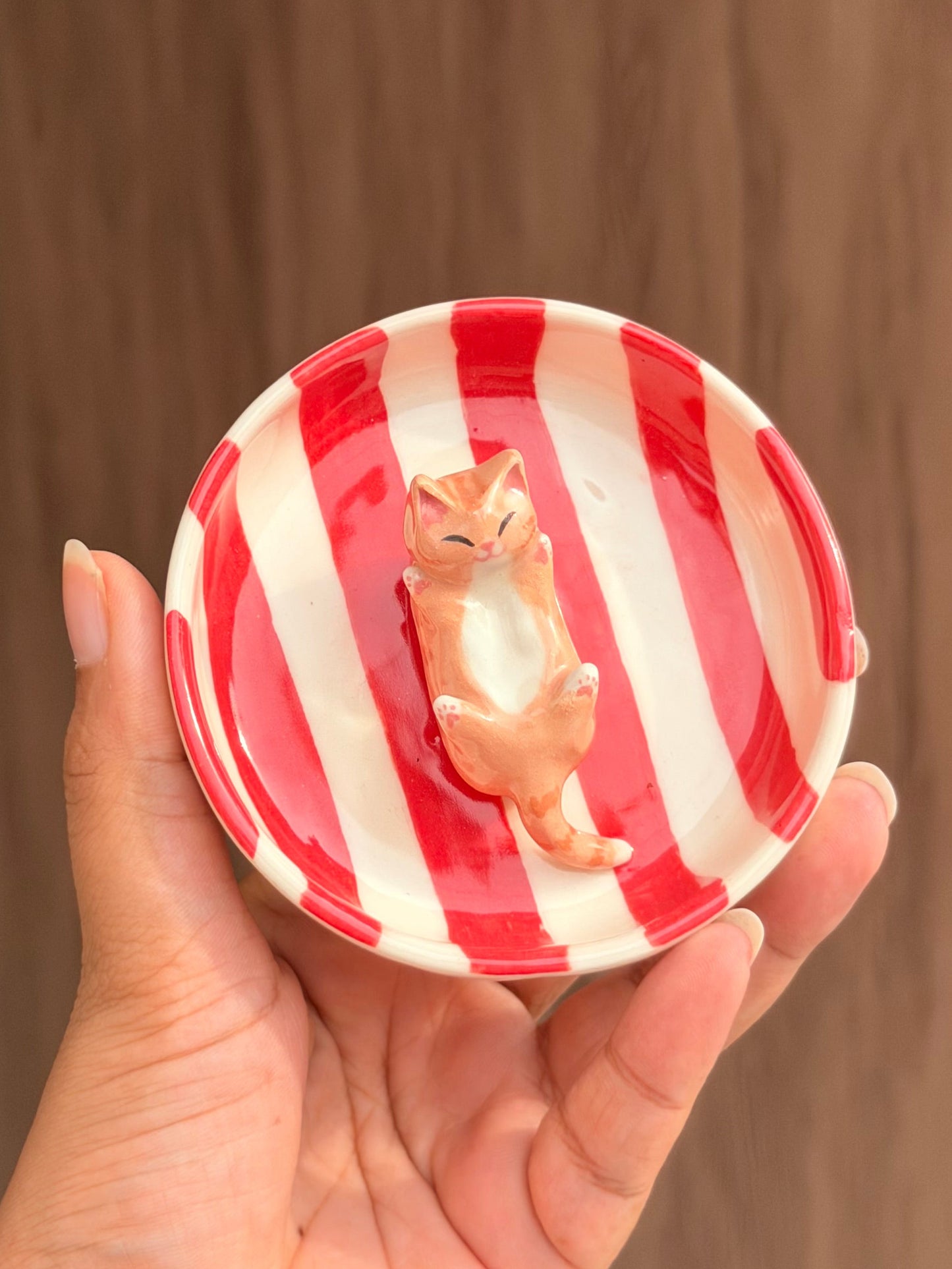 Orange happy cat trinket