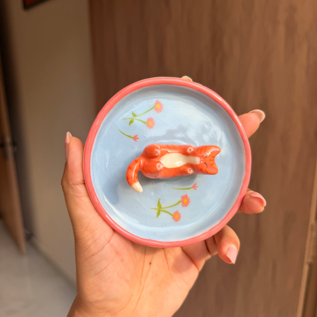 Orange happy cat trinket