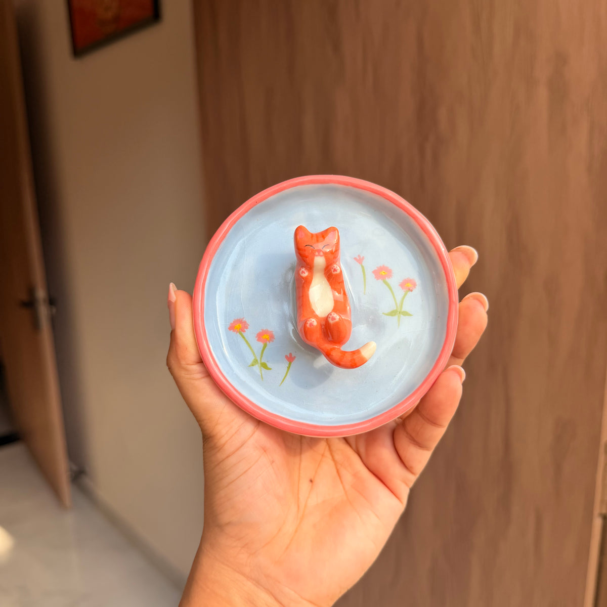 Orange happy cat trinket