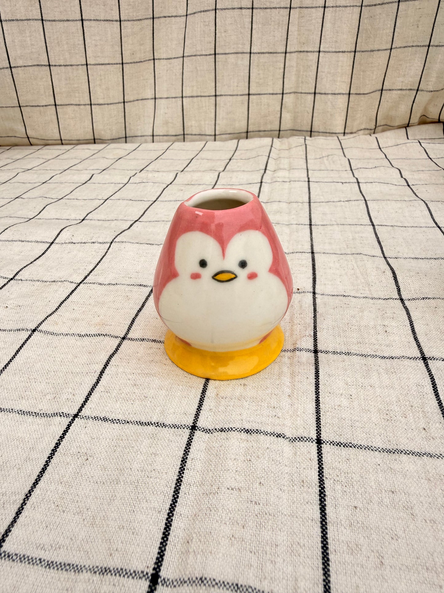 Pink penguin whisk holder